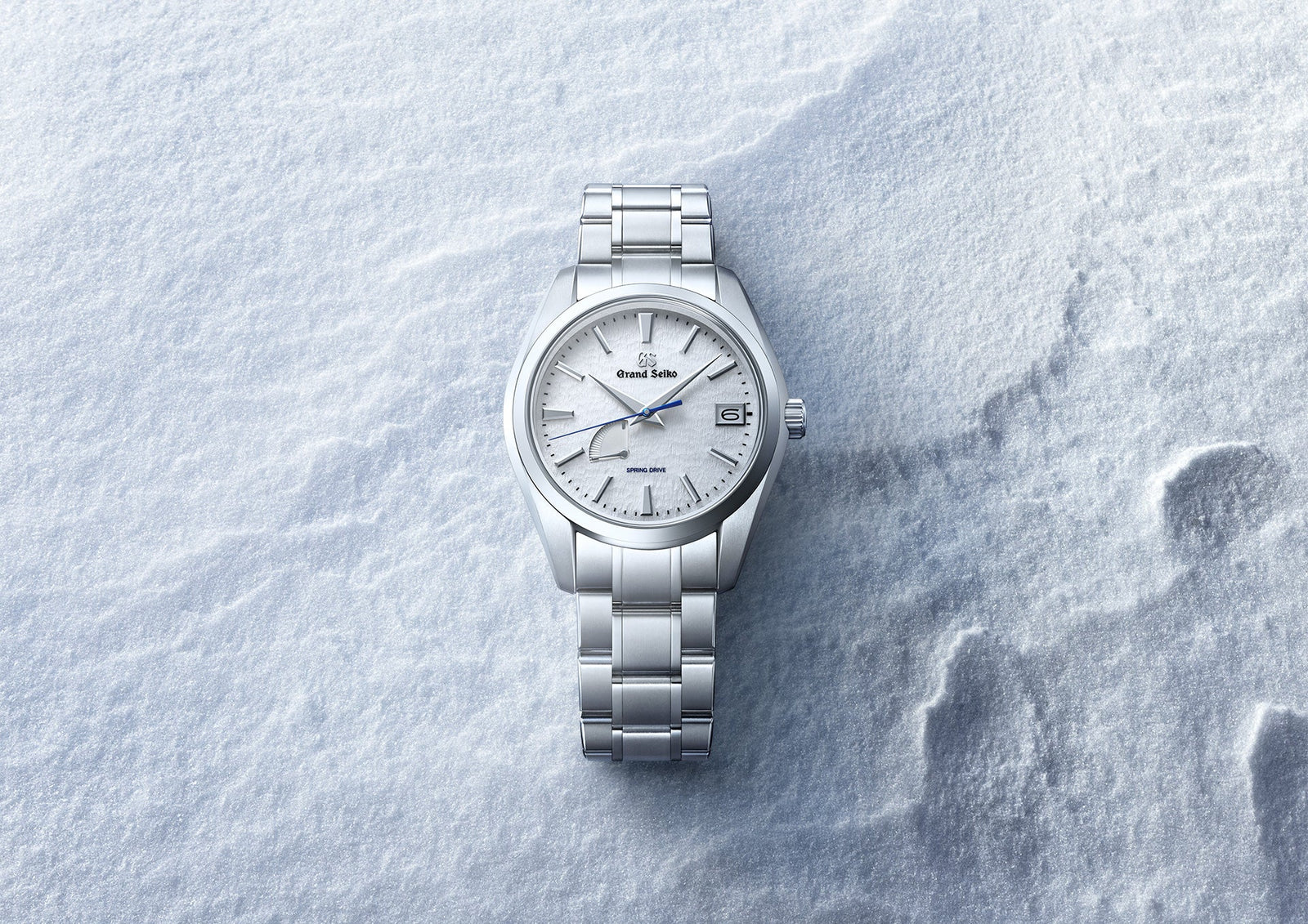 Grand Seiko Snowflake and Apple Watch, on one wrist - Smartlet