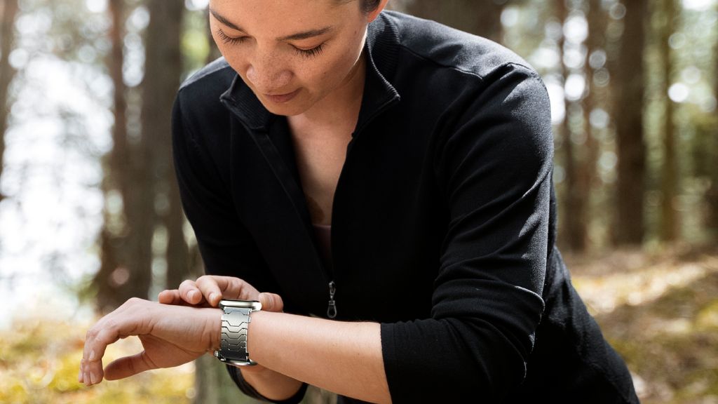 Smartlet Classic adapter on a canvas NATO strap with Apple Watch and Hamilton Khaki Field worn together in an outdoor field context
