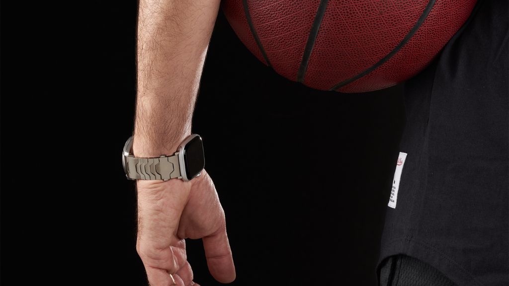 Smartlet Titanium adapter worn on a wrist alongside a mechanical watch and Apple Watch, demonstrating the studio-to-presentation dual-wear setup