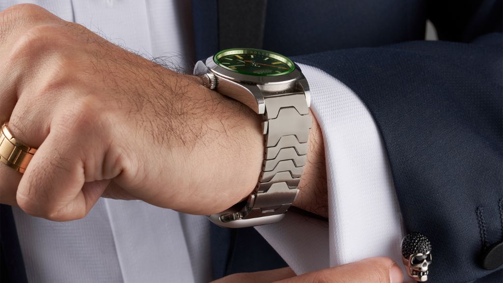 Smartlet Titanium adapter in a daily active wear context, Apple Watch on the inner wrist and mechanical watch on the outer wrist during a working day