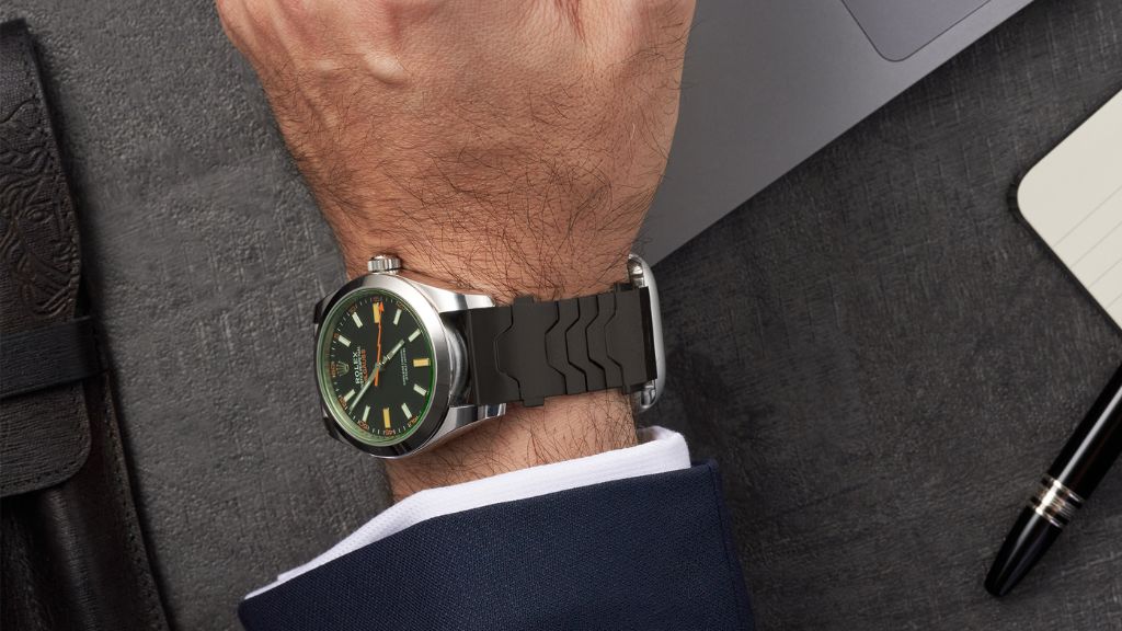 Smartlet Shadow adapter worn with a dress watch and smartwatch in a corporate professional context, demonstrating forearm positioning and discretion